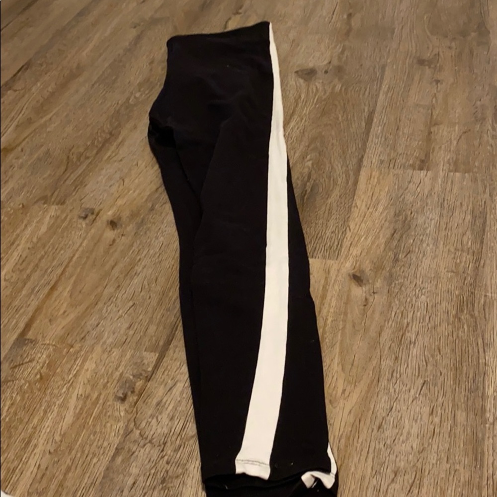 Black leggings with white stripe down both sides